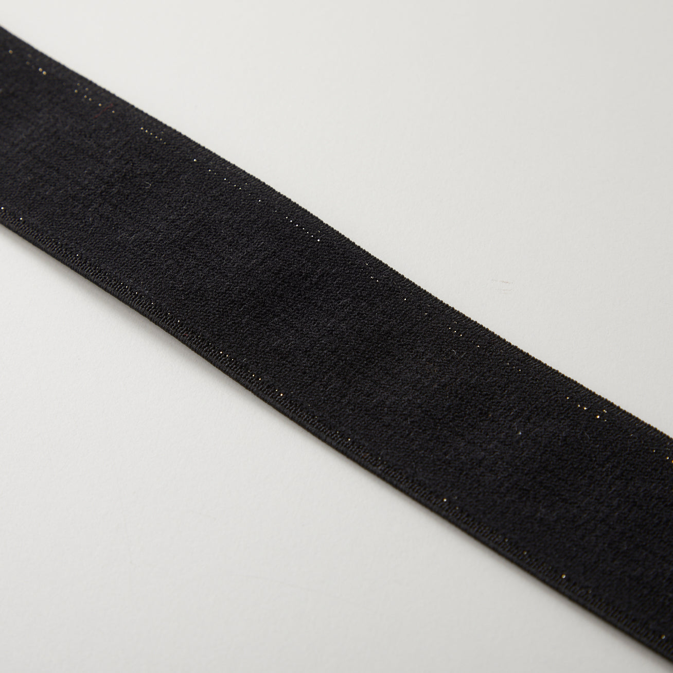 23-002-1m-ファンシーウエスト織りゴム-平ゴム-ブラック×ゴールド（１mカット商品）