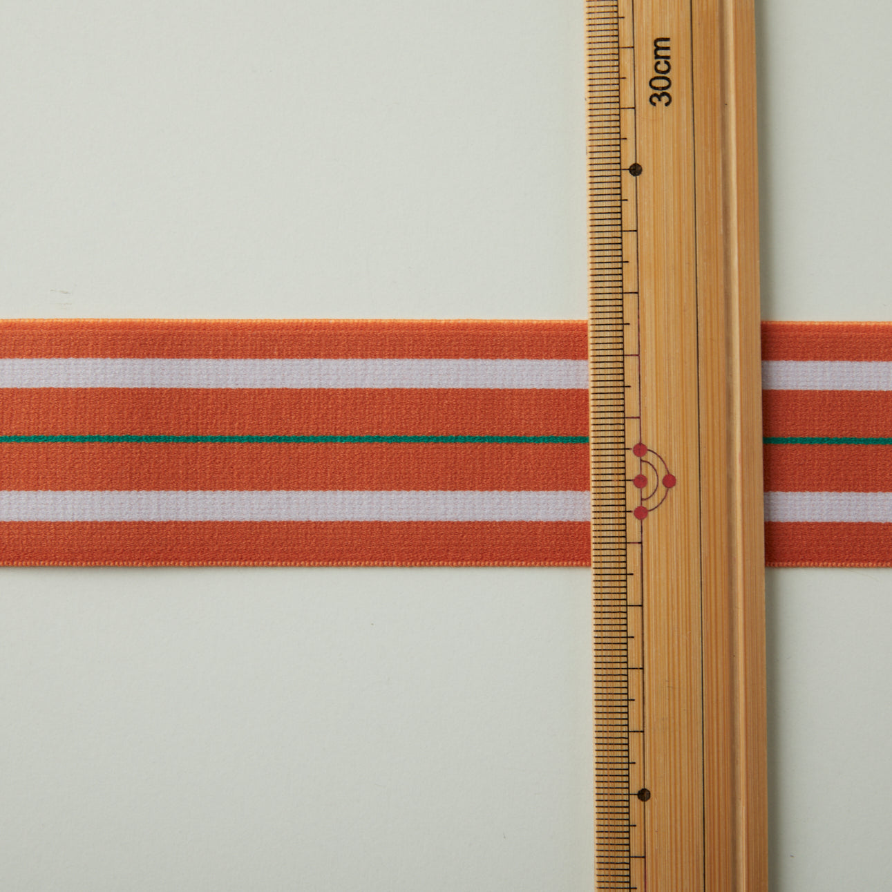 23-009-1m-ウエストマーク織りゴム-平ゴム-オレンジ（１mカット商品）×ベビーピンク